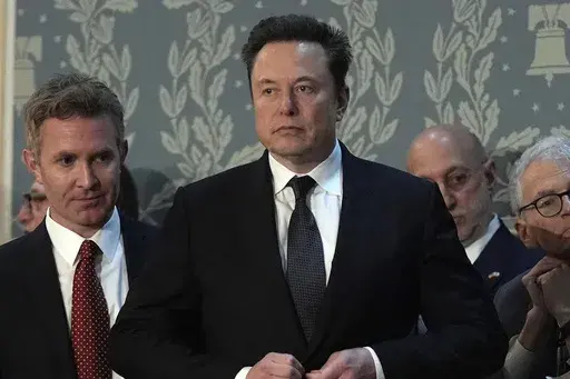 Elon Musk arrives before a joint meeting of Congress at the Capitol in Washington, July 24, 2024. (AP Photo/Julia Nikhinson, File)