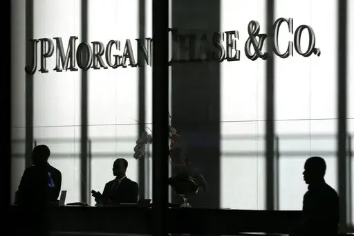 The JPMorgan Chase & Co. logo is displayed at their headquarters in New York on Oct. 21, 2013. You'll no longer be able to store your precious coins, jewelry and paperwork at JPMorgan Chase & Co., as the bank has stopped opening new safety deposit boxes for customers. A spokesman for the bank said Chase decided late last year to stop offering new deposit boxes to customers as a “business decision” but declined to share specifics. (AP Photo/Seth Wenig, File)