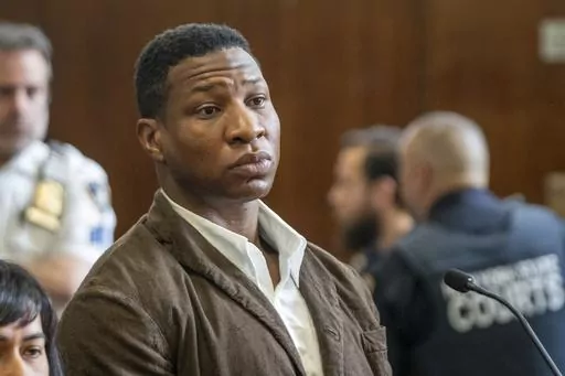 Jonathan Majors is seen in court during a hearing in his domestic violence case, Tuesday, June 20, 2023 in New York. Majors’ domestic violence case will go to trial Aug. 3, the judge said Tuesday, casting him in a real-life courtroom drama as his idled Hollywood career hangs in the balance. (AP Photo/Steven Hirsch, Pool)