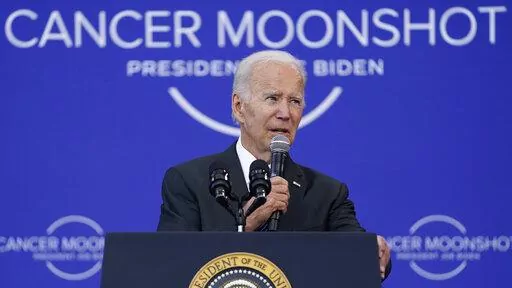 President Joe Biden speaks on the cancer moonshot initiative at the John F. Kennedy Library and Museum, Monday, Sept. 12, 2022, in Boston. (AP Photo/Evan Vucci)