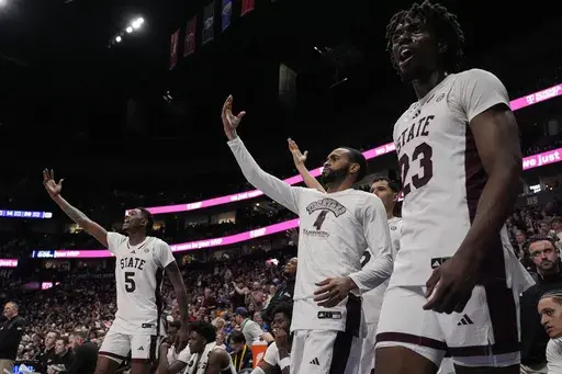 Mississippi State players celebrate a win over LSU after an NCAA college basketball game at the Southeastern Conference tournament, Wednesday, March 12, 2025, in Nashville, Tenn. (AP Photo/George Walker IV)