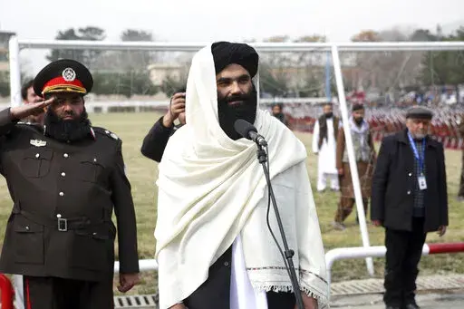 Taliban acting Interior Minister Sirajuddin Haqqani speaks during a graduation ceremony at the police academy in Kabul, Afghanistan, Saturday, March 5, 2022. A rare public show of division has arisen in the ranks of Afghanistan's ruling Taliban. A senior Taliban figure publicly criticized the group's leadership in a speech, accusing some of monopolizing power. The comments by Interior Minister Sirajuddin Haqqani were seen as directed at the Taliban's supreme leader, Haibatullah Akhundzada. (AP P