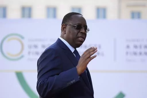 Senegal's President Macky Sall arrives for the closing session of the New Global Financial Pact Summit, Friday, June 23, 2023 in Paris. Senegalese President Sall declared Monday evening, July 3, that he will not run for a third term in next year's elections, ending years of uncertainty over his political future that had helped fuel deadly opposition protests last month. (AP Photo/Lewis Joly, Pool, File)
