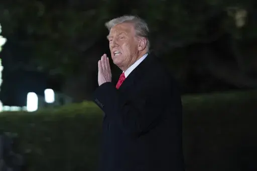 President Donald Trump arrives on the South Lawn of the White House, in Washington, Monday, Feb. 10, 2025. (AP Photo/Jose Luis Magana)