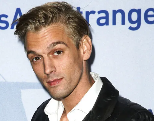 Singer Aaron Carter arrives at a premiere of "Saints & Strangers" at the Saban Theater in Beverly Hills, Calif., Nov. 9, 2015. Carter, the singer-rapper who began performing as a child and had hit albums starting in his teen years, was found dead Saturday, Nov. 5, 2022, at his home in Southern California. He was 34. (Photo by Rich Fury/Invision/AP, File)
