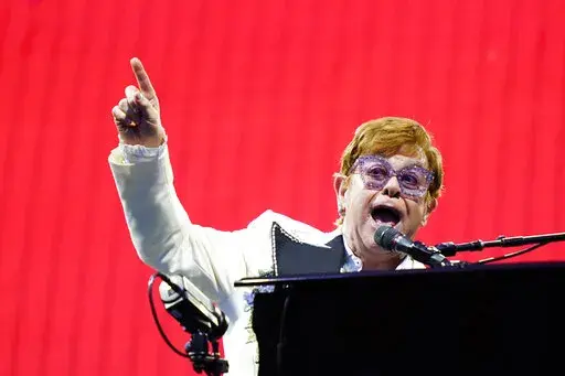 Elton John performs during his "Farewell Yellow Brick Road," tour, Friday, July 15, 2022, at Citizens Bank Park in Philadelphia. The White House will become a concert venue Friday, Sept. 23, when Elton John performs. The event is called “A Night When Hope and History Rhyme,” a reference to a poem by Seamus Heaney that President Joe Biden often quotes. (AP Photo/Matt Rourke, File)