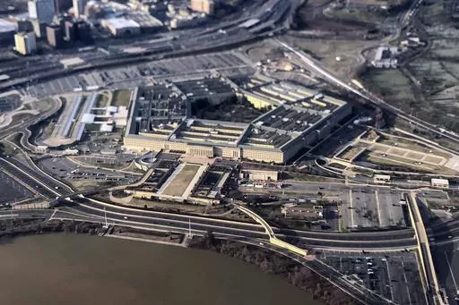 The Pentagon is seen in this aerial view made through an airplane window in Washington, Jan. 26, 2020. The Defense Department found $300 million for weapons for Ukraine in March 2024, even though the bill to fund the military aid is stalled in Congress. (AP Photo/Pablo Martinez Monsivais, File)