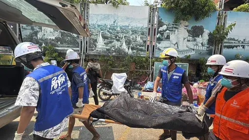 Rescuers carry the body of a victim, from a collapsed building, in the aftermath of Friday's earthquake in Mandalay, Myanmar, Thursday, April 3, 2025. (AP Photo)