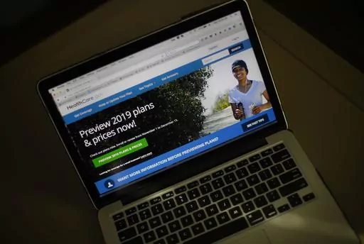 The HealthCare.gov website is photographed in Washington, Wednesday, Oct. 31, 2018. Open enrollment is no one’s idea of a good time, but health coverage is a crucial part of your financial health. Whether you’re getting insurance through an employer or the Affordable Care Act marketplace, it’s important to ask the right questions before you choose a plan for 2024. (AP Photo/Pablo Martinez Monsivais, File)