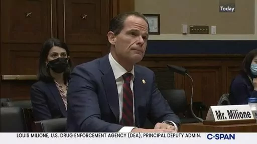 In this image from video provided by C-SPAN, Louis Milione, the U.S. Drug Enforcement Administration's deputy administrator, speaks during a hearing held by the House Energy and Commerce Subcommittee on Health in Washington on Dec. 2, 2021. Milione, the DEA’s second-in-command, quietly resigned in 2023, amid reporting by The Associated Press that he previously consulted for a pharmaceutical distributor sanctioned for a deluge of suspicious painkiller shipments and did similar work for the drug