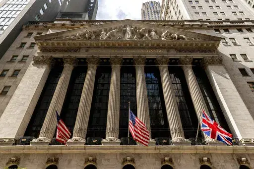 Statues adorn the facade of the New York Stock Exchange, Tuesday, Sept. 13, 2022, in New York. Wall Street is surging at the opening bell, Thursday, Nov. 10,  after a government report showed inflation eased by even more than economists expected last month.  (AP Photo/Julia Nikhinson, File)