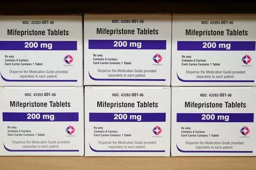 Boxes of the drug mifepristone sit on a shelf at the West Alabama Women's Center in Tuscaloosa, Ala., March 16, 2022. A federal judge in Texas on Friday, April 7, 2023, ordered a hold on the U.S. approval of the abortion medication mifepristone, throwing into question access to the nation’s most common method of abortion in a ruling that waved aside decades of scientific approval. Federal lawyers representing the FDA are expected to swiftly appeal the ruling. (AP Photo/Allen G. Breed, File)