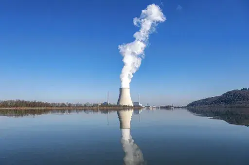 The nuclear power plant (NPP) Isar 2 is pictured in Essenbach, Germany, March 3, 2022. German Chancellor Olaf Scholz has ordered preparations for all of the country's three remaining nuclear reactors to continue operating until mid-April 2023. The move marks another hiccup in the country's long-running plan to end the use of atomic energy. (Armin Weigel/dpa via AP, File)