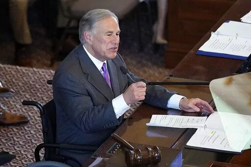 Texas Gov. Greg Abbott addresses the House Chamber at the Texas Capitol during the first day of the 88th Texas Legislative Session in Austin, Texas, Tuesday, Jan. 10, 2023. (AP Photo/Eric Gay)