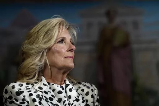 First lady Jill Biden waits to speak at the Library of Congress in Washington, Wednesday, April 19, 2023, during a reception with congressional members and spouses showcasing bipartisan support for cancer prevention and early detection. (AP Photo/Susan Walsh, File)