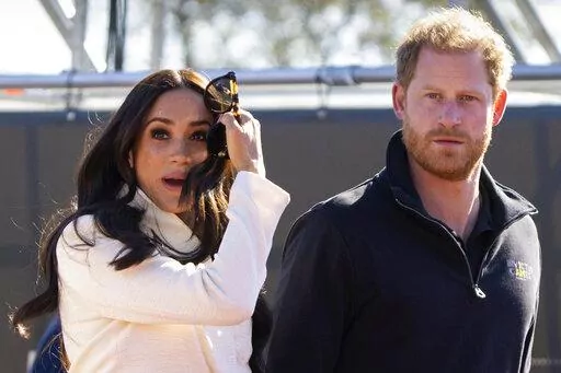 Prince Harry and Meghan Markle, Duke and Duchess of Sussex visit the track and field event at the Invictus Games in The Hague, Netherlands, Sunday, April 17, 2022. Prince Harry and his wife, Meghan, are expected to vent their grievances against the monarchy when Netflix releases the final episodes of a series about the couple’s decision to step away from royal duties and make a new start in America. (AP Photo/Peter Dejong, File)