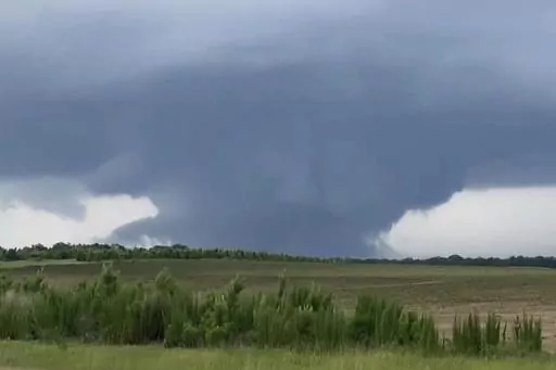 This screenshot taken from a video shows a tornado on June 14, 2023, in Blakely, Ga. Officials from Texas to Georgia are reporting damaging winds and possible tornadoes as a powerful storm system crosses the South. (Rand McDonald via AP)