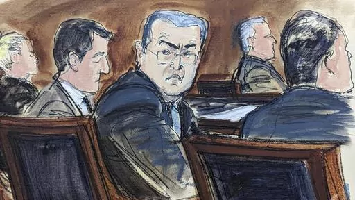 In this courtroom sketch from federal court in New York, Tuesday, Feb. 20, 2024, former Honduran President Juan Orlando Hernández, seated center at the defense table, turns to looks at prospective jurors during the jury selection process at the start of his trial. Hernández took the witness stand in his defense at his New York trial on Tuesday, March 5, denying that he teamed up with drug dealers to protect them in return for millions of dollars in bribes. (Elizabeth Williams via AP, File)