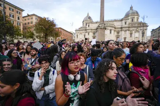 People stage a protest on 'International Safe Abortion Day' to ask for more guarantees on the enforcement of the abortion law that they claim is seriously endangered by the high rate of doctors' conscientious objection in the country, in Rome, Wednesday, Sept. 28, 2022. (AP Photo/Alessandra Tarantino)