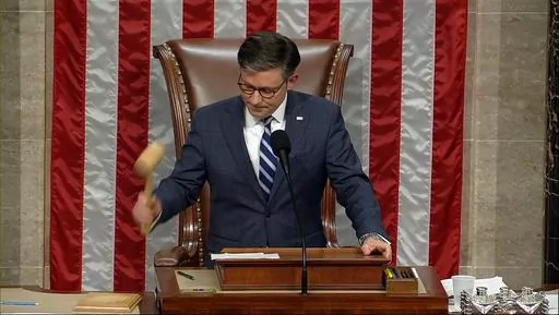 This image from House Television shows House Speaker Mike Johnson of La., banging the gavel after he announced the House voted to impeach Homeland Security Secretary Alejandro Mayorkas over the Biden administration's handling of the U.S-Mexico border, at the U.S. Capitol Tuesday, Feb. 13, 2024, in Washington. (House Television via AP)