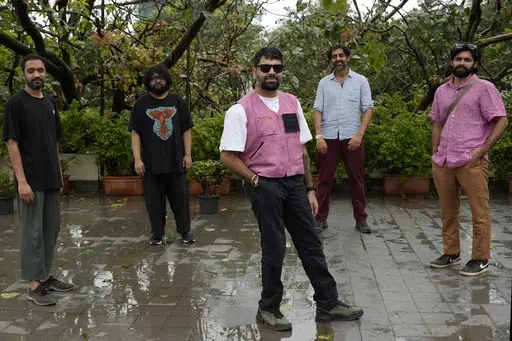 From left, Rohit Gupta, Kartik Pillai, Karan Singh, Suryakant Sawhney, and Dhruv Bhola of Peter Cat Recording Co. pose for a photograph in Mumbai, India, Friday, Aug. 2, 2024. (AP Photo/Rajanish Kakade)