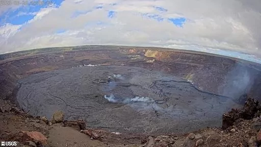 This webcam image provided by the U.S. Geological Survey shows the summit of the Kilauea volcano in Hawaii, Tuesday, June 20, 2023. An eruption of the Hawaii volcano that began nearly two weeks earlier has come to a pause, scientists said. Kilauea, one of the most active volcanoes in the world, began erupting June 7 after a three-month pause, displaying fountains of glowing red lava without threatening any communities or structures. (U.S. Geological Survey via AP)
