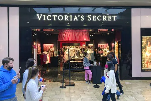 A Victoria's Secret store is seen in a shopping mall in Scranton, Pa., May 3, 2021. Victoria’s Secret & Co. said it has signed a definitive agreement to acquire Adore Me, Inc., a lingerie startup known for its wide array of sizes, for $400 million in cash. The move, announced Tuesday, Nov. 1, 2022 comes as Victoria’s Secret aims to become more inclusive and diversify beyond its sexy image of thongs and other come-hither lingerie. (AP Photo/Ted Shaffrey, file)