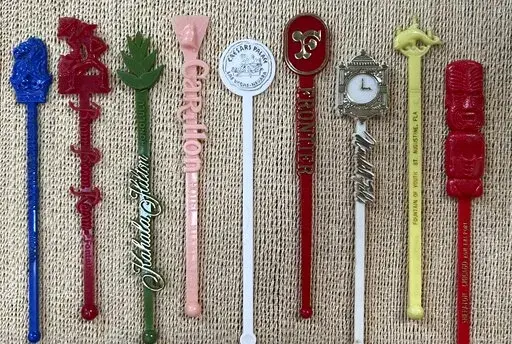 A collection of swivel sticks from various venues. Chances are if you’ve been to a great restaurant, bar or hotel, you’ve snagged a coaster, matchbook, napkin or card key. Mementoes like these help us remember a fun experience. (Elaine Markoutsas via AP)