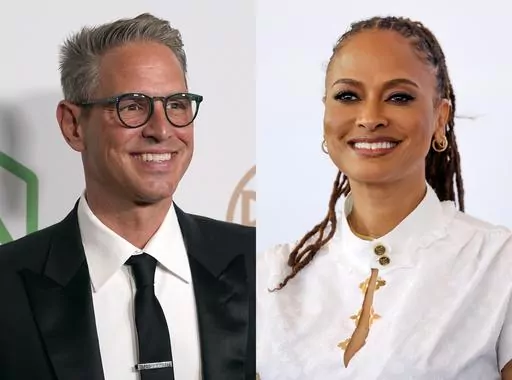 This combination of photos shows Greg Berlanti at the 33rd annual Producers Guild Awards in Los Angeles on March 19, 2022, left, and director Ava Duvernay at the photo call for the film "Origin" during the 80th edition of the Venice Film Festival in Venice, Italy, on Sept. 6, 2023. Berlati and Duvernay are included on a list hat scores them for the diversity and inclusion of the people working both on screen and behind the scenes. (AP Photo)