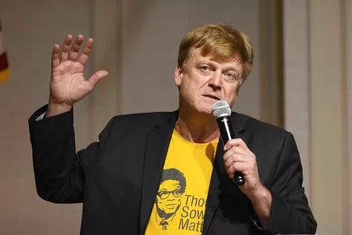 Patrick Byrne speaks during a panel discussion at the Nebraska Election Integrity Forum on Saturday, Aug. 27, 2022, in Omaha, Neb. (AP Photo/Rebecca S. Gratz)