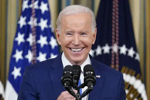 President Joe Biden smiles as he speaks in the State Dining Room of the White House in Washington, Wednesday, Nov. 9, 2022. Biden turns 80 on Sunday, Nov. 20. (AP Photo/Susan Walsh, File)