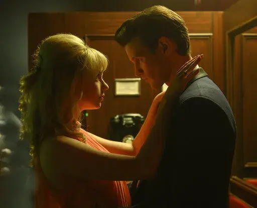 This image released by Focus Features shows Anya Taylor-Joy, left, and Matt Smith in Edgar Wright's "Last Night in Soho." (Parisa Taghizadeh/Focus Features via AP)