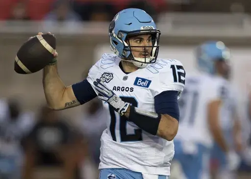 Toronto Argonauts quarterback Chad Kelly (12) throws against the Montreal Alouettes during the first half of a Canadian Football League game in Montreal, Sept. 15, 2023. (Christinne Muschi/The Canadian Press via AP, File)