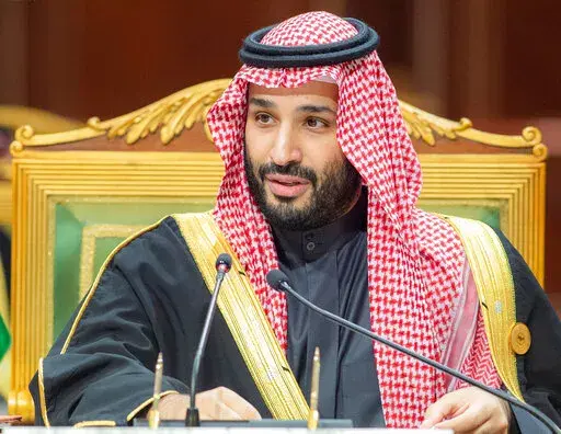 In this photo released by Saudi Royal Palace, Saudi Crown Prince Mohammed bin Salman, speaks during the Gulf Cooperation Council (GCC) Summit in Riyadh, Saudi Arabia, Tuesday, Dec. 14, 2021. Strategic U.S. interests in oil and security are pushing President Joe Biden toward meeting with Saudi Crown Prince Mohammed bin Salman during an overseas trip later this month. (Bandar Aljaloud/Saudi Royal Palace via AP, File)