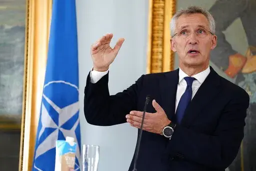 NATO Secretary General Jens Stoltenberg gestures as he attends a meeting at Kastellet in Copenhagen, Denmark, Thursday May 19, 2022. (Martin Sylvest/Ritzau Scanpix via AP)