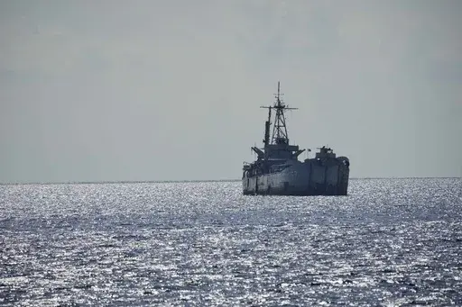 Philippine navy ship BRP Sierra Madre is seen at the Second Thomas Shoal, locally known as Ayungin Shoal, at the South China Sea, April 23, 2023. A Chinese vessel and a Philippine supply ship collided near the disputed Spratly Islands in the South China Sea on Monday, June 17, 2024, China's coast guard said.(AP Photo/Aaron Favila)