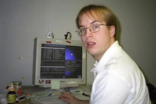 Paul Buchheit, the former Google engineer who created Gmail, works at the company's offices in Mountain View, Calif., in Dec. 10, 1999. Buchheit was the 23rd employee hired at Google, a company that now employs more than 180,000 people. (April Buchheit via AP)