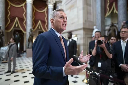 Speaker of the House Kevin McCarthy, R-Calif., talks to reporters at the Capitol in Washington, Monday, July 17, 2023. House conservatives in a group known as the Freedom Caucus have unveiled a list of demands that they want included in a stopgap spending measure to keep the federal government running after the end of September. It's a smorgasbord of non-starters for the Democratic-controlled Senate and the White House, signaling the challenges McCarthy will face next month to get a bill passed 