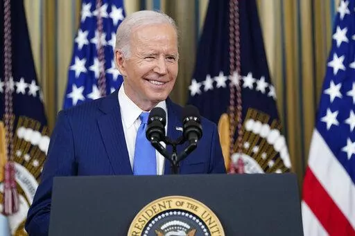 President Joe Biden arrives to speak in the State Dining Room of the White House in Washington, Wednesday, Nov. 9, 2022. (AP Photo/Susan Walsh)