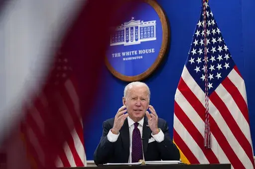 President Joe Biden speaks during a meeting with the President's Council of Advisors on Science and Technology at the Eisenhower Executive Office Building on the White House Campus, Thursday, Jan. 20, 2022. (AP Photo/Andrew Harnik)