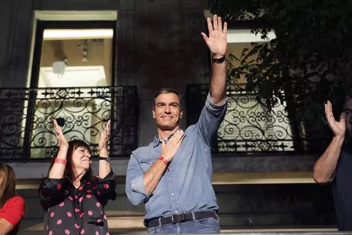 Socialist Workers' Party leader and current Prime Minster Pedro Sanchez greets supporters outside the party's headquarters in Madrid, Spain, Sunday, July 23, 2023. Ballots from Spaniards living abroad were counted Friday, July 28, and they gave a new twist to the inconclusive results from the general election. The conservative Popular Party gained an additional seat from Madrid’s constituency late in the day at the expense of the Socialist Workers’ Party. (AP Photo/Emilio Morenatti, File)