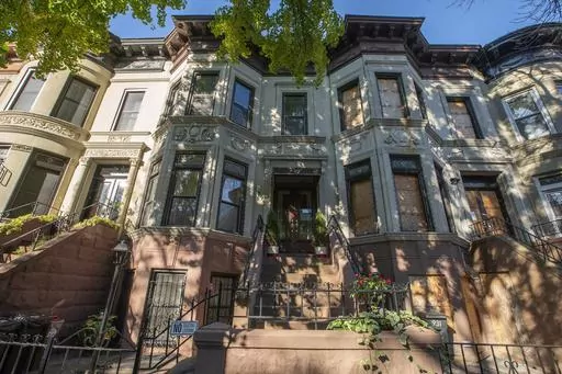 Gated front steps lead up to the 929 unit residency at Crown Highs in Brooklyn, New York Thursday, Nov. 2, 2023. Federal agents raided the home of Brianna Suggs, a top fundraiser and longtime confidante to New York City Mayor Eric Adams, Thursday, Nov. 2, 2023, in the Brooklyn borough of New York. (AP Photo/Eduardo Munoz Alvarez)