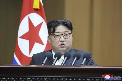 In this photo provided by the North Korean government, North Korean leader Kim Jong Un speaks at the Supreme People's Assembly in Pyongyang, North Korea, on Jan. 15, 2024. Independent journalists were not given access to cover the event depicted in this image distributed by the North Korean government. The content of this image is as provided and cannot be independently verified. Korean language watermark on image as provided by source reads: "KCNA" which is the abbreviation for Korean Central N