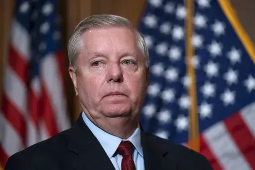 Sen. Lindsey Graham, R-S.C., the ranking member of the Senate Budget Committee, waits to speak to reporters following bi-partisan passage of the Ending Forced Arbitration of Sexual Assault and Sexual Harassment Act, at the Capitol in Washington, Feb. 10, 2022. Graham is among a handful of Republicans declaring a willingness to back President Joe Biden's nominee to the Supreme Court. Graham has been promoting U.S. District Judge Michelle Childs as his preferred choice to replace the retiring Just