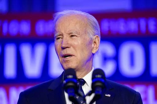 President Joe Biden delivers remarks to the 2023 International Association of Fire Fighters Legislative Conference, Monday, March 6, 2023, in Washington. (AP Photo/Evan Vucci)