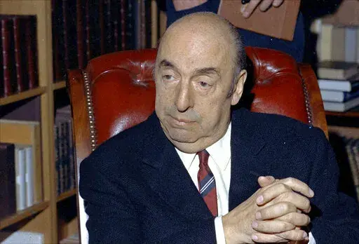 In this October 21, 1971 file photo, Nobel Prize winning poet Pablo Neruda sits in Paris France. Neruda was awarded his Nobel in 1971. Forensic experts have determined that Chilean poet Pablo Neruda was poisoned, Rodolfo Reyes, the Nobel Prize winner’s nephew, said on Monday, Feb. 13, 2023. (AP Photo/Michel Lipchitz, File)