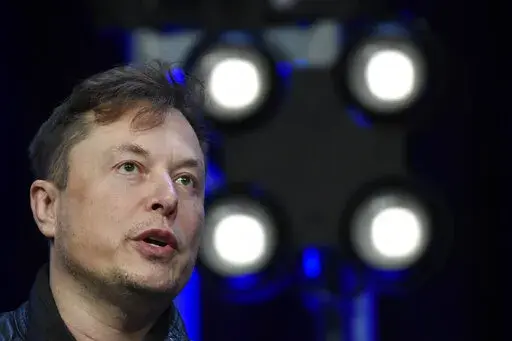 Elon Musk speaks at the SATELLITE Conference and Exhibition on March 9, 2020, in Washington. Twitter's new owner and Tesla CEO Musk has sold nearly $4 billion worth of Tesla shares, according to regulatory filings. (AP Photo/Susan Walsh, File)
