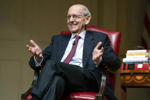Then-Supreme Court Justice Stephen Breyer speaks during an event at the Library of Congress for the 2022 Supreme Court Fellows Program hosted by the Law Library of Congress, Feb. 17, 2022, in Washington. The Supreme Court doesn't appear to have found the person who leaked a draft of the court's major abortion decision earlier this year. In a television interview set to air on Sept. 25, 2022, Breyer says that to his knowledge the person's identity has not been determined. Breyer was speaking in a