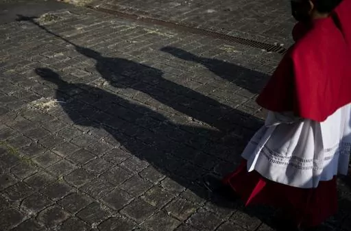 Catholics take part in a reenactment of the Stations of the Cross during the Lenten season at the Metropolitan Cathedral in Managua, Nicaragua, Friday, March 17, 2023. Amid tensions between the Vatican and the Daniel Ortega government, Catholics staged the devotional commemoration of Jesus Christ's last day on Earth in the gardens of the Cathedral due to the police ban on celebrating religious festivities on the streets. (AP Photo/Inti Ocon)