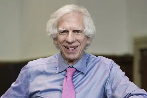 Judge Arthur Engoron poses for a picture in his courtroom in New York, Thursday, Sept. 28, 2023. Starting Monday, Oct. 2, Engoron will preside over a non-jury trial in Manhattan to resolve remaining claims in New York Attorney General Letitia James’ lawsuit against former President Donald Trump, his company and top executives. (AP Photo/Seth Wenig)